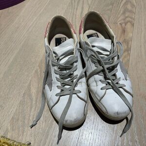 white golden goose sneakers with pink glitter back